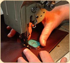 The stones are flat-cut into cabashons for a strong inlay.